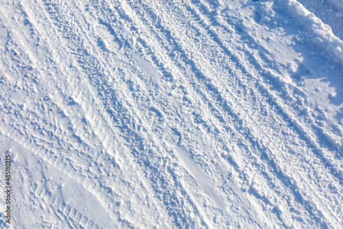 White snow on the road as an abstract background.