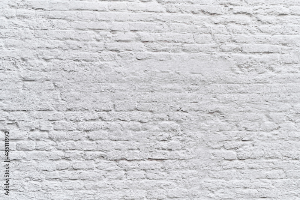 Painted white brick wall surface background Painted white brick wall surface background