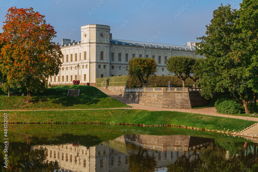 Palace and park ensemble of Gatchina Park: Karpin Pond, Gatchina Palace, private palace garden on a sunny autumn day, Gatchina, St. Petersburg, Russia