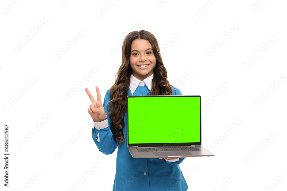 happy face of teen girl with long curly hair show computer isolated on white, peace happy face of teen girl with long curly hair show computer isolated on white, peace