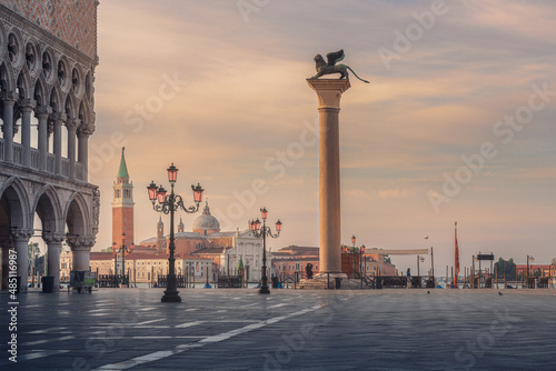 Venice, Italy. Beautiful sunrise at the San Marco square with Column di San Marco and Doges Palace in Venezia