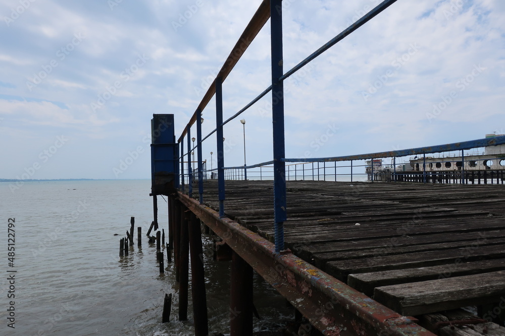 wooden pier over the sea, destroyed pier, ruined pier, the black sea