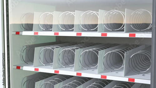 Foto Empty snack vending machine closeup, detail, no items, nothing inside, lack of food products, food sold out