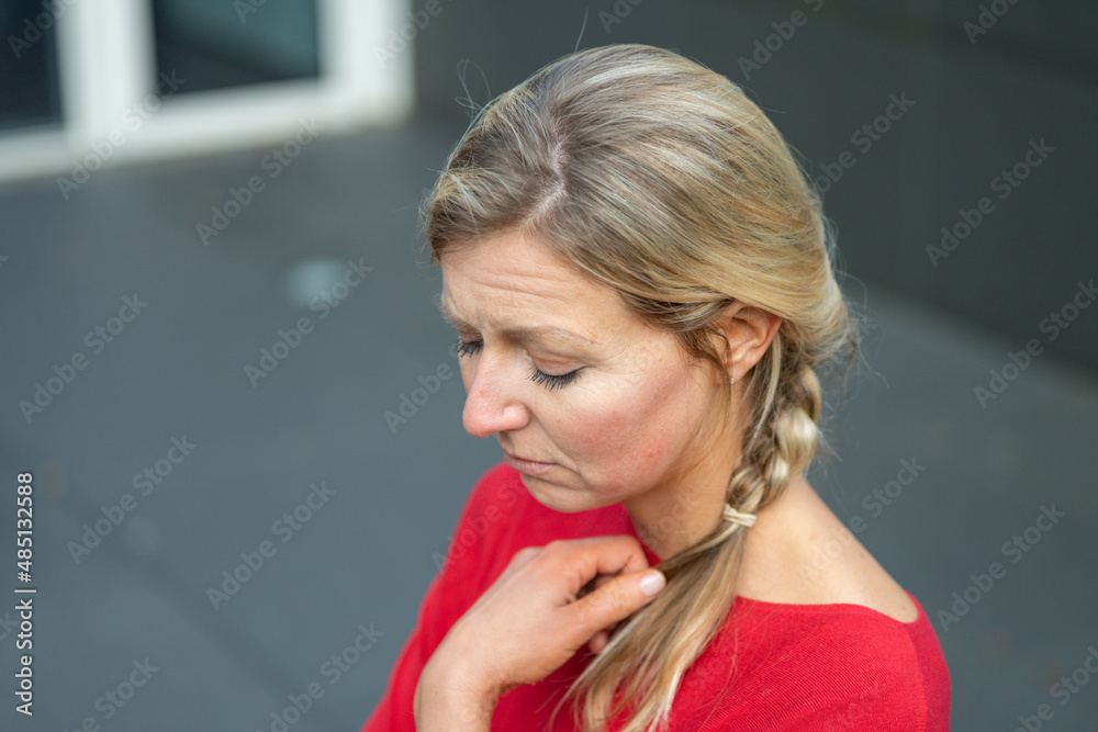 View from above of a long haired blond woman View from above of a long haired blond woman