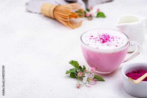 Pink matcha latte with milk photo