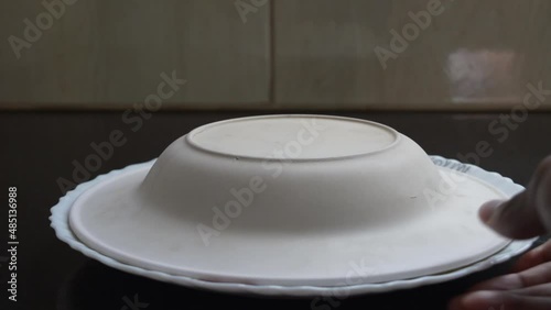 Uncovering food on kitchen counter
