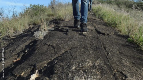 person hiking on a mountain trail