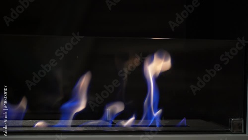 Biofireplace burn on ethanol gas. Modern smart ecological alternative technologies. Modern bio fireplot fireplace on ethanol gas. Burning bio fireplace. Close up of flame. photo