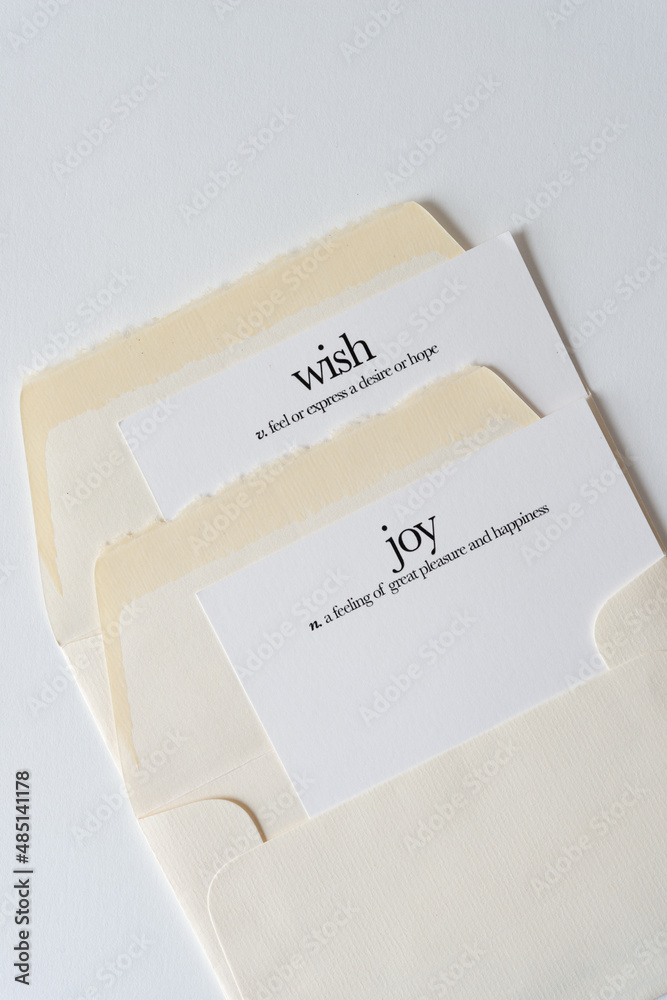 two envelopes with cards and the words two envelopes with cards and the words