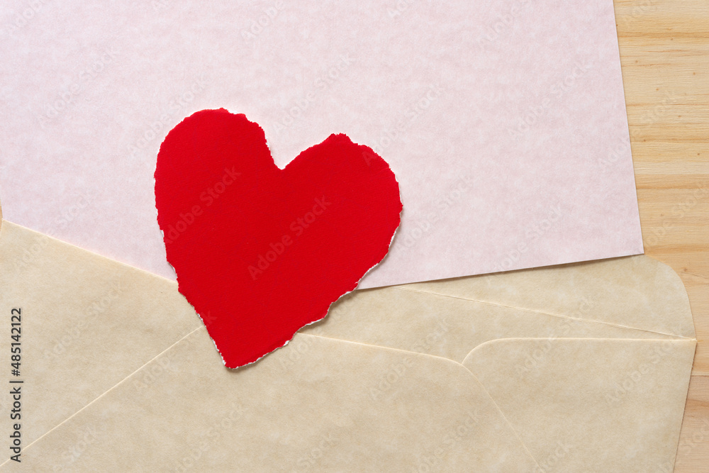 torn red heart on paper torn red heart on paper
