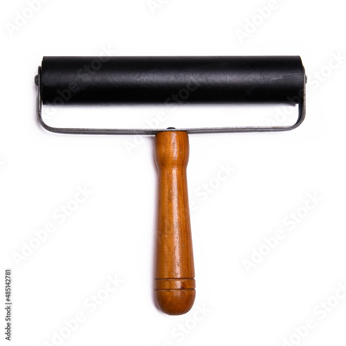 rubber pressure roller with a wooden handle, photographed against a white background