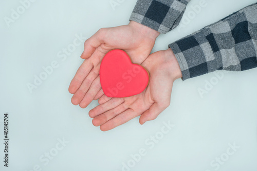 Valentine's Day, colorful gingerbread in the palms.