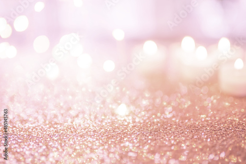 Pink sparkling mothers day background with bright bokeh for greetings. 