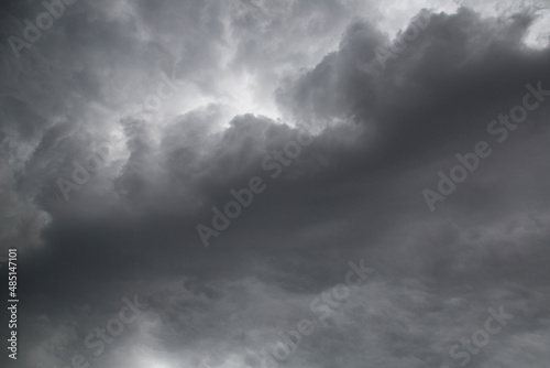 Dark strorm clouds during a thunderstorm in UK. Nature weather background.