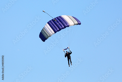 Skydiver in a blue sky 