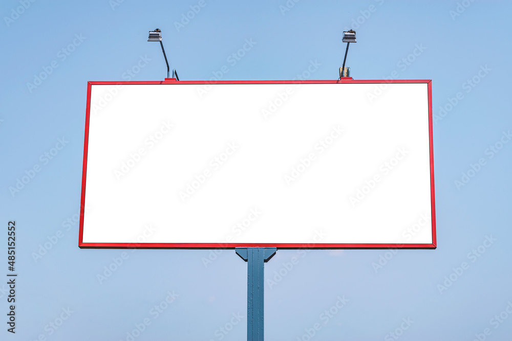Blank billboard mockup with white screen. Against the backdrop of nature and blue sky. Business concept. Copy space banner for advertising. Blank billboard mockup with white screen. Against the backdrop of nature and blue sky. Business concept. Copy space banner for advertising.