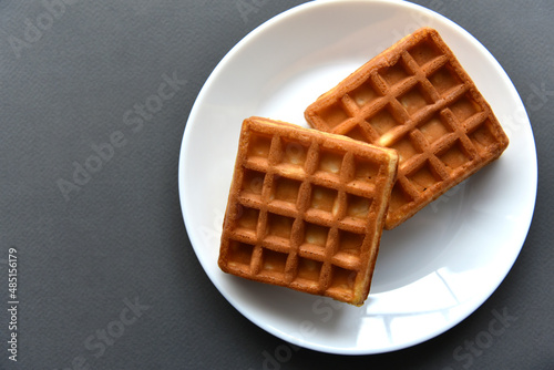 Viennese soft waffles on a white plate photo
