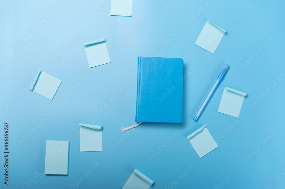 Notebook and pen. Notepad and reminder stickers. Lots of tasks. Notebook and pen. Notepad and reminder stickers. Lots of tasks.