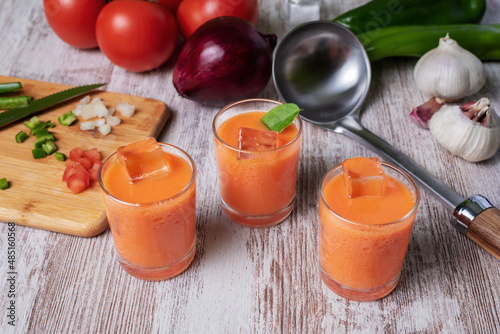 Gazpacho, cold soup typical of Andalusia based on tomato, garlic, pepper and onion. Presented in small glasses to drink.