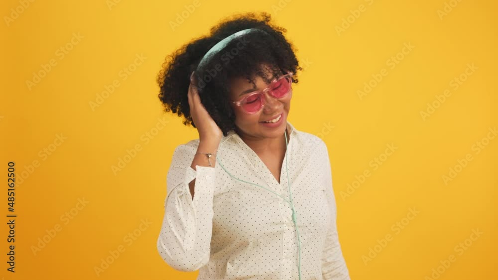 Happy smiling African American woman with afro hairstyle happy positive smile chat email laptop isolated over color background. Happy smiling African American woman with afro hairstyle happy positive smile chat email laptop isolated over color background.