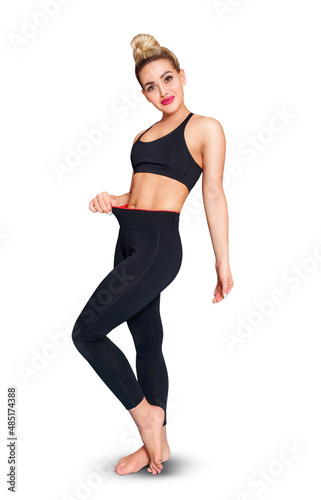 Beautiful fitness woman posing isolated on white background. © Galaxy_love_design