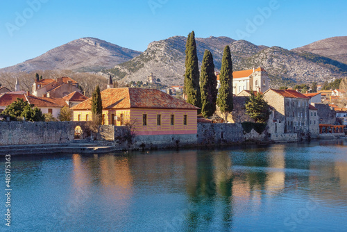 Wallpaper Mural Beautiful view of Old Town of Trebinje city and Trebisnjica river on  sunny winter day.  Bosnia and Herzegovina, Republika Srpska Torontodigital.ca