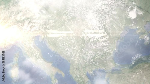 Earth zoom in from outer space to city. Zooming on Serbia, Belgrade. The animation continues by zoom out through clouds and atmosphere into space. View of the Earth at night. Images from NASA