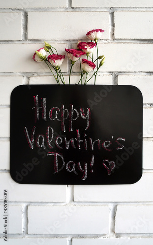 lettering happy valentine's day on chalkboard