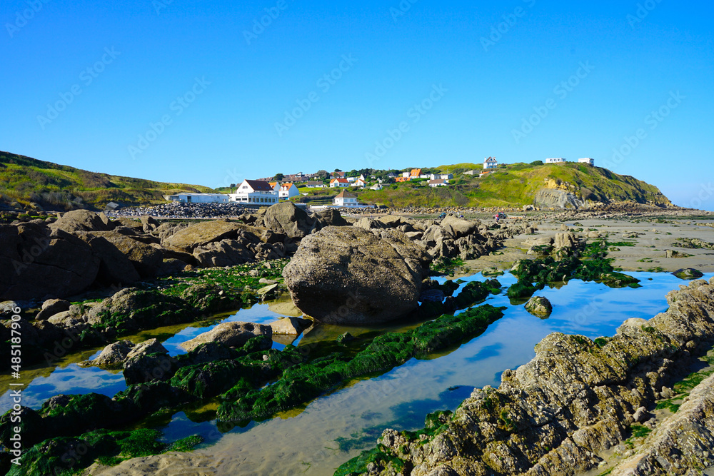Rocks and houses on the coast of Cap Gris Nez at a beautiful sunny day, Pas-de-Calais, Hauts-de-France, France
