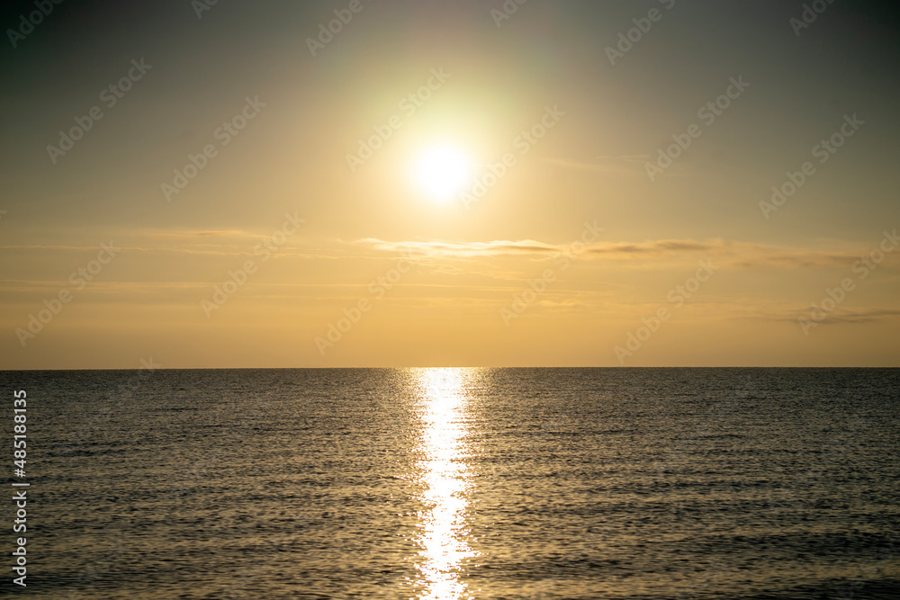 sunset and sunrise over the sea