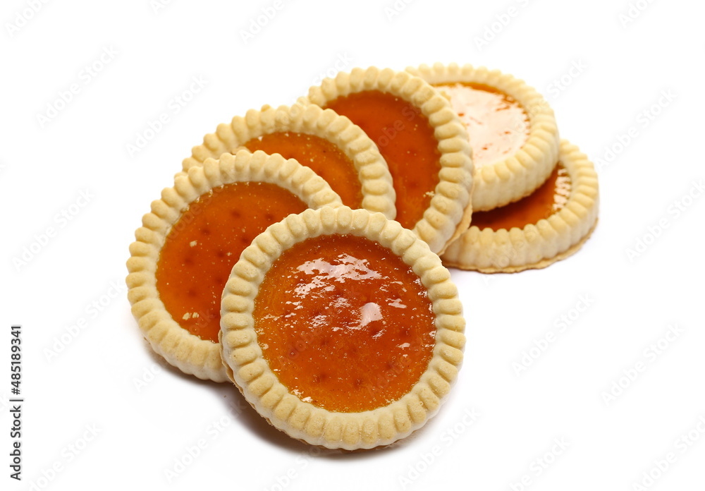 Biscuit with butter filled with apricot fruit filling isolated on white Biscuit with butter filled with apricot fruit filling isolated on white