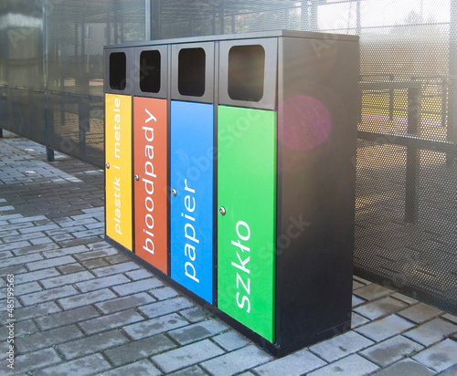 A trash bin with waste separation in the public place.