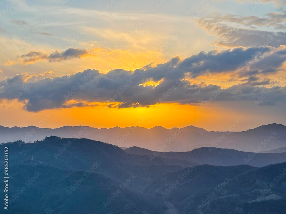Colorful sunset on top of Albanian mountains. Holidays concept.