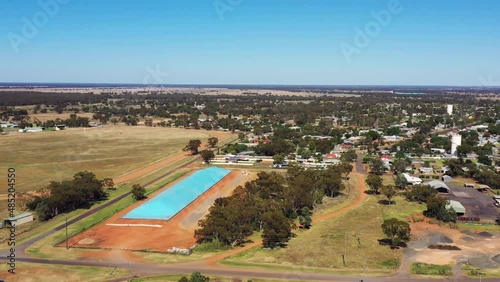 Panorama of Nyngan town shopping village and streets in aerial 4k hover.
 photo