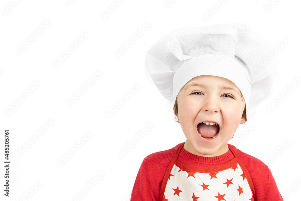 Close-up of smiling child chef on white background Close-up of smiling child chef on white background
