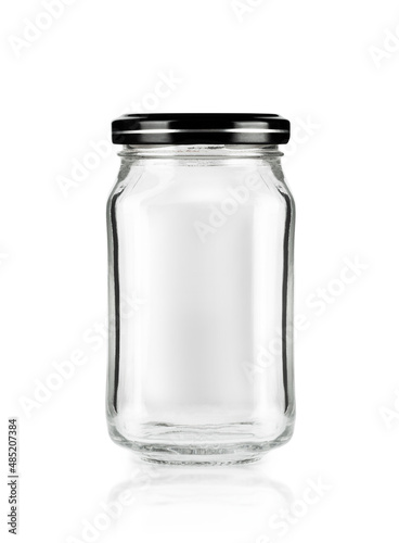 Empty jar with black cap isolated on white