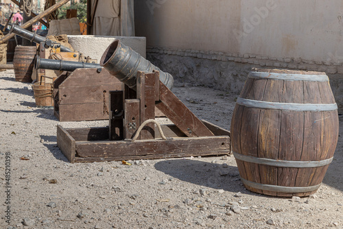 outdoor exhibition of different ancient cannons and powder kegs