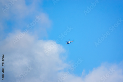 British army AgustaWestland AW159 Wildcat AH1 helicopter flying over Salisbury Plain (SPTA) UK clear blue sky