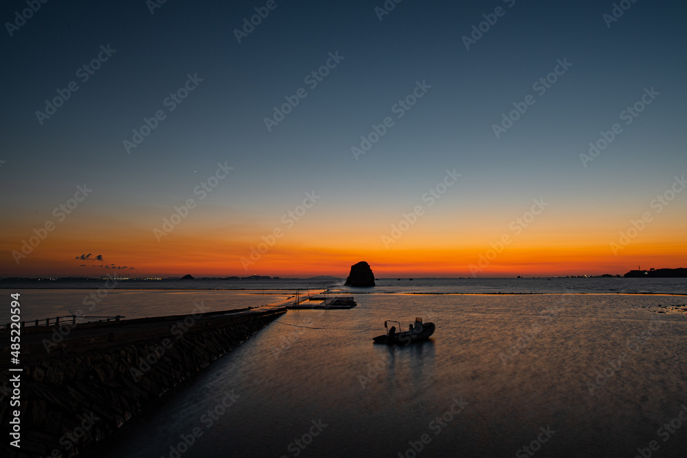 Beach and sunset with island view
