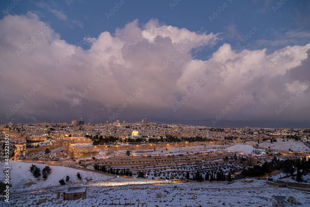 aerial view of jerusalem with snow and dome of the rock