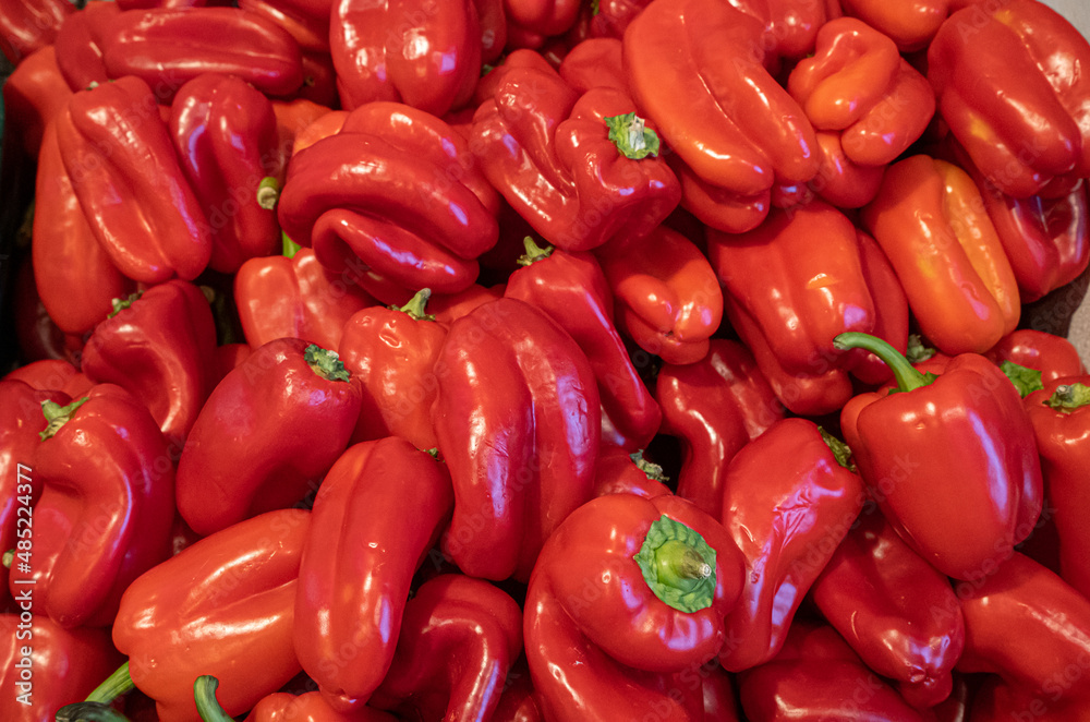 A display of red peppers for sale in a grocery store in Slame, Oregon A display of red peppers for sale in a grocery store in Slame, Oregon