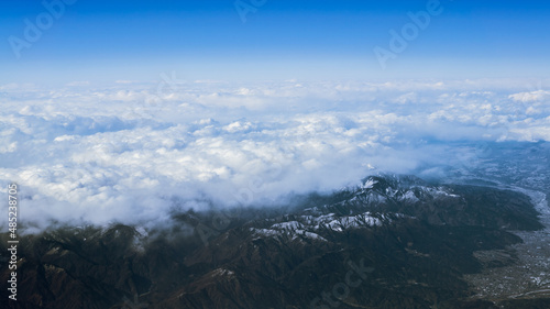 Wonderful landscape with japanese summit mountains above dense low clouds. Japan © REC Stock Footage