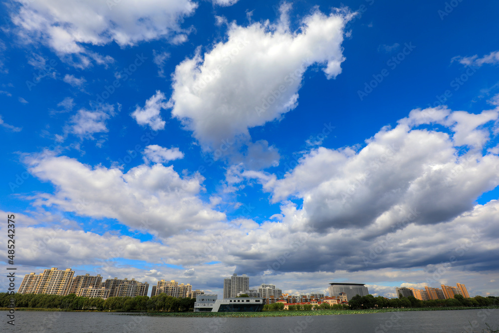Sunny waterfront urban architectural scenery, North China Sunny waterfront urban architectural scenery, North China