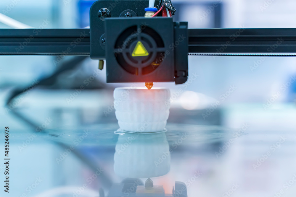 3D printer or additive manufacturing and robotic automation technology. 3D printer or additive manufacturing and robotic automation technology.
