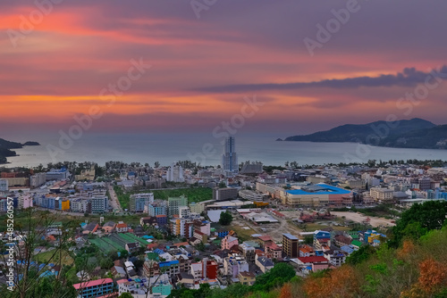 Colourful Sunset Patong Beach lovely vibrant orange, pink and Blue colours Phuket Thailand Thai  © Elias Bitar