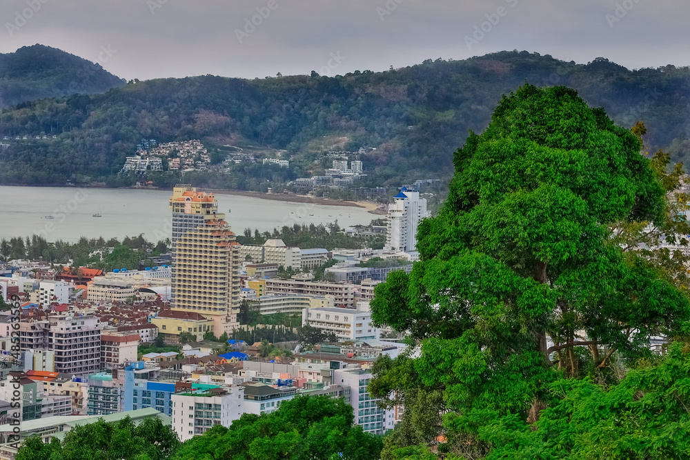 Obraz premium Colourful Sunset Patong Beach lovely vibrant orange, pink and Blue colours Phuket Thailand Thai 
