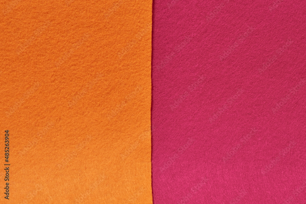 The background is made of felt in burgundy and orange colors The background is made of felt in burgundy and orange colors