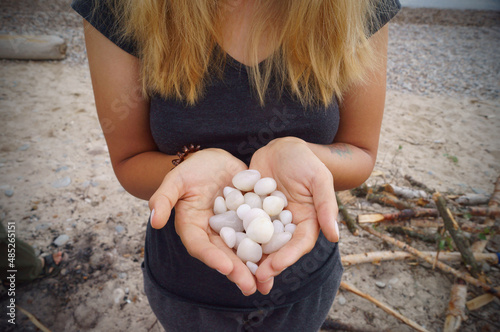 woman holding a stone