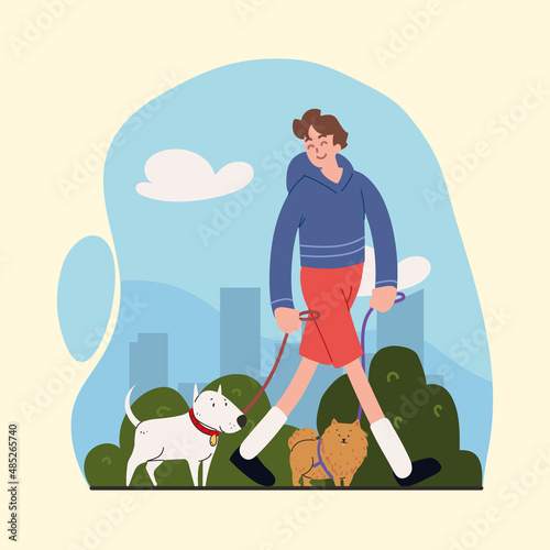 man walk with dogs