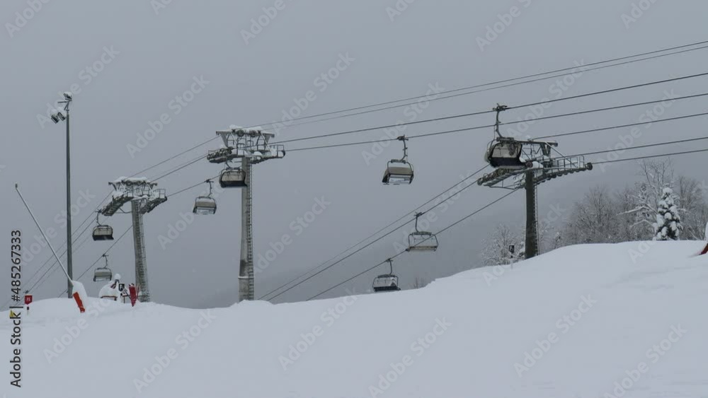 Cable car motion and snowboarder is on ski resort Gazprom. Sochi, Krasnaya Polyana, Russia.
Cable car motion and snowboarder is on ski resort Gazprom. Sochi, Krasnaya Polyana, Russia.